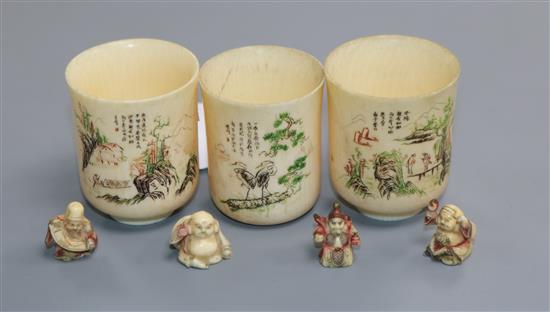 Three Chinese ivory cups, Republic period and four Japanese miniature ivory figures of immortals